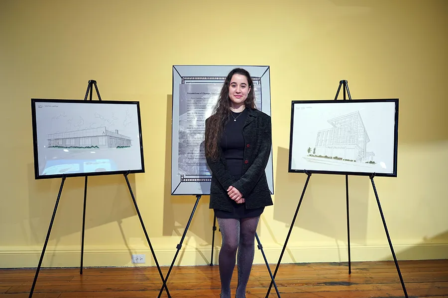 Architectural Technology student Melina Alvarez showed off drawings of two Wake Tech buildings at the annual "A Night at the Museum" event.