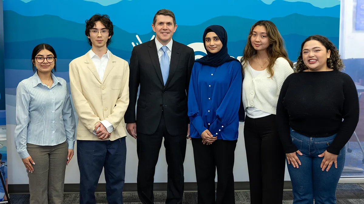 North Carolina State Treasurer Brad Briner poses with Wake Tech students.