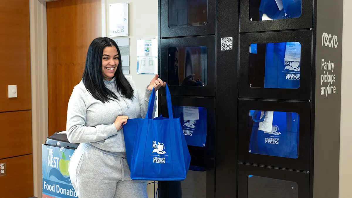 A Wake Tech student picks up an order from the Care Box on Perry Health Sciences Campus.