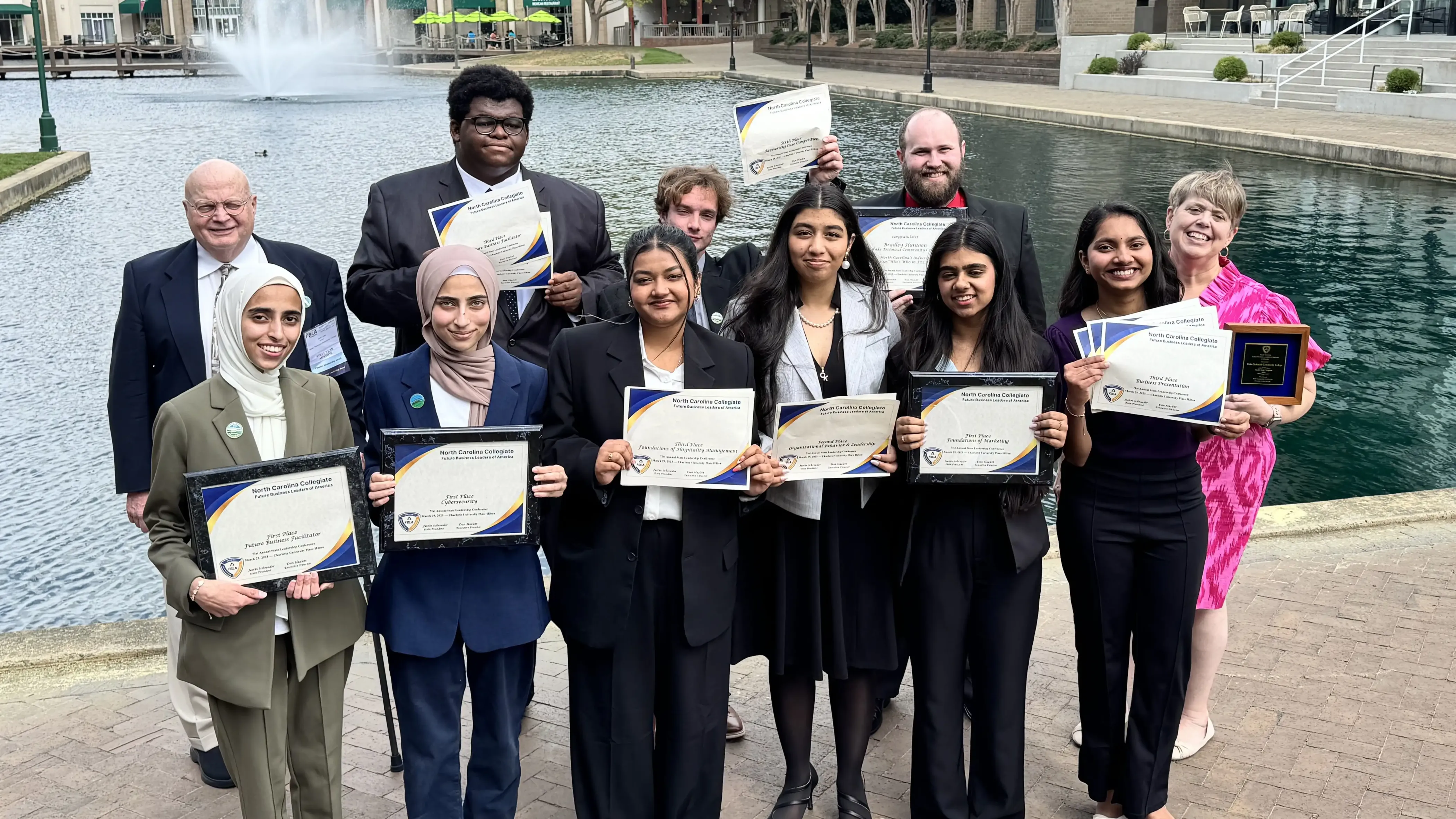 Wake Tech students pose with awards they won at the North Carolina Future Business Leaders of America conference.