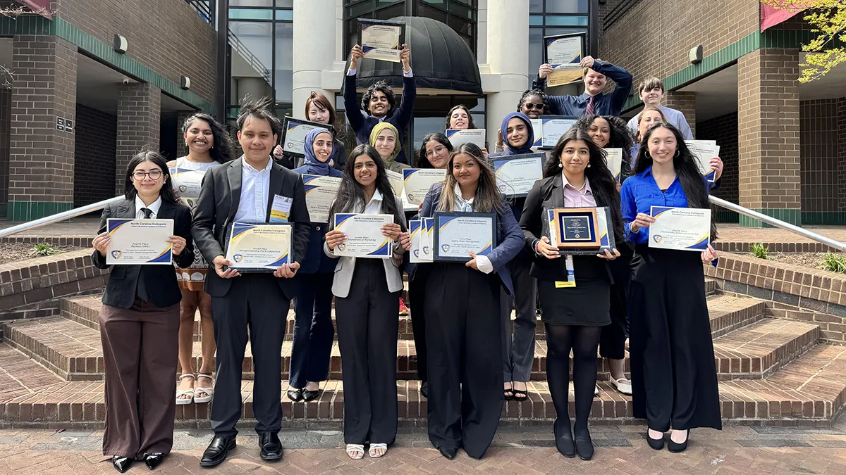 Nineteen Wake Tech students pose for a photo after winning awards at the Future Business Leaders of America Collegiate State Leadership Conference.
