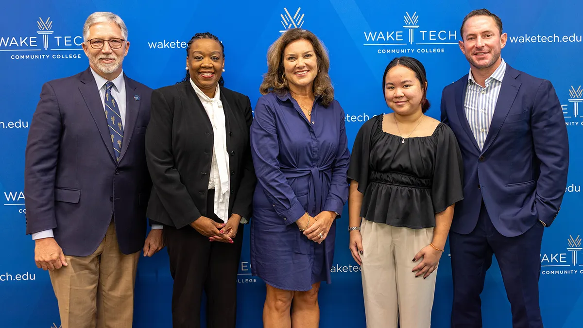 Wake Tech President Dr. Scott Ralls, left, poses with new Board of Trustees members, left to right, Kenyatta Elliott, Jen Willis, SGA President Daniela Rebong and Temple Sloan.