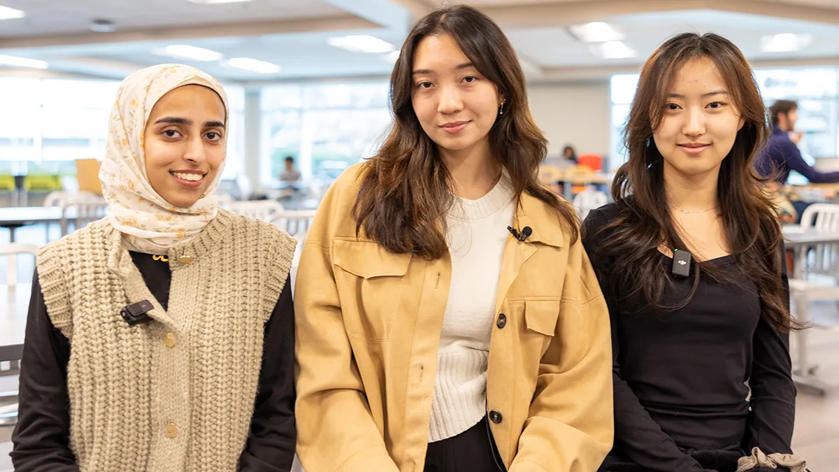Wake Tech students Mannal Amjad, Elle Ruiz ad Sehyun Park