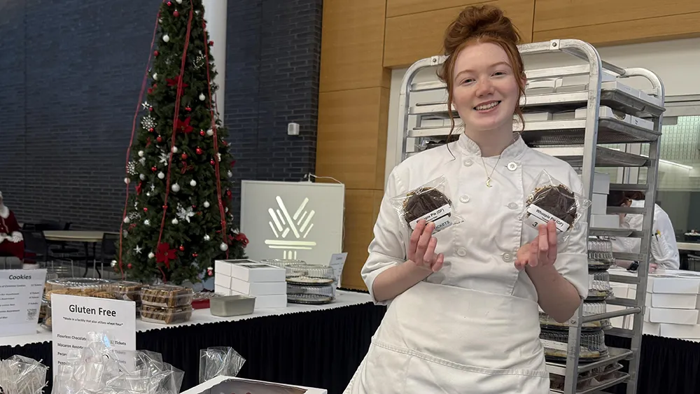 Baking & Pastry Arts graduate Cayleigh Ingram sells her sweet creations at Wake Tech's Bakers' Row event.