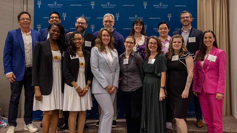 Business Pitch winners and judges pose for a photo