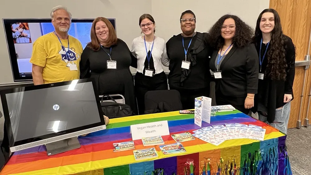 Wake Tech students pose with the owners of Vegan Health & Wealth after assisting the company with its marketing strategy.