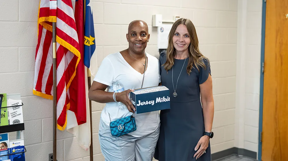  Wake Tech Associate Vice President Scarlet Edwards, right, with a student veteran