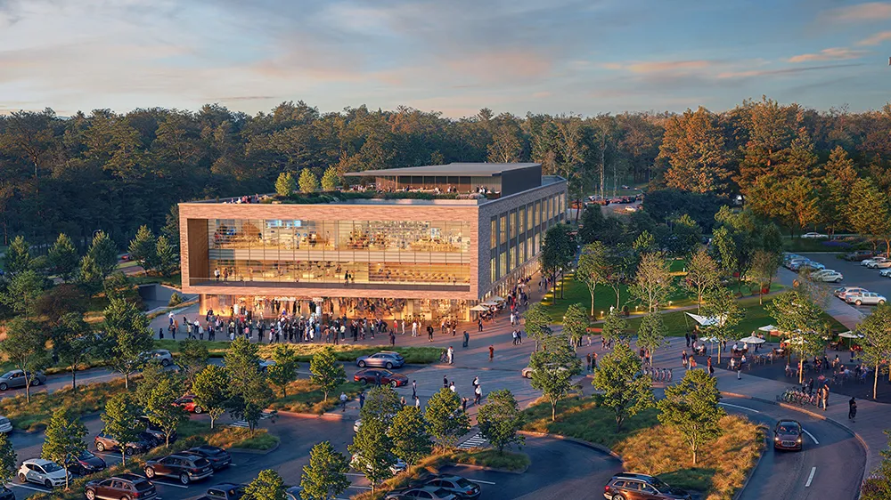 An architectural rendering of Wake Tech's planned Conlon Western Wake Campus depicts a building in the background and a pond in the foreground.