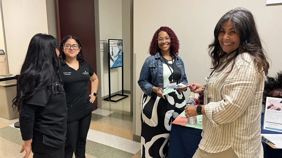 Wake Tech staff and students provide information about the college's programs and services to Spanish-speaking adults during the Open House en Español.