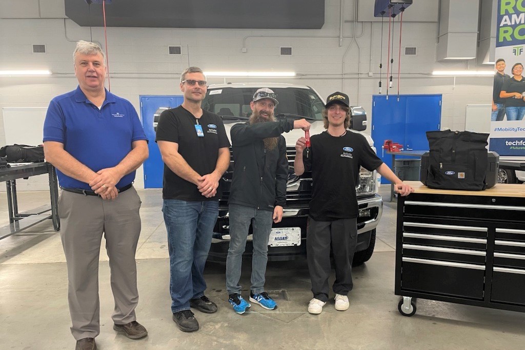Dave Favre, Wake Tech Dean of Transportation Technologies; Tom Skibinski, Wake Tech instructor; Charles Sanville, The Humble Mechanic; Jeffrey Johnson, Wake Tech student   