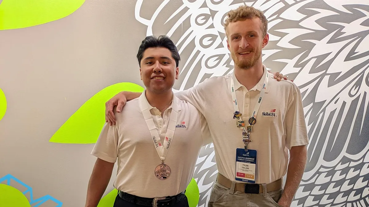 Jimmy Chavez-Perez, left, and Tyler Collins pose for a photo at the SkillsUSA National Leadership & Skills Conference.