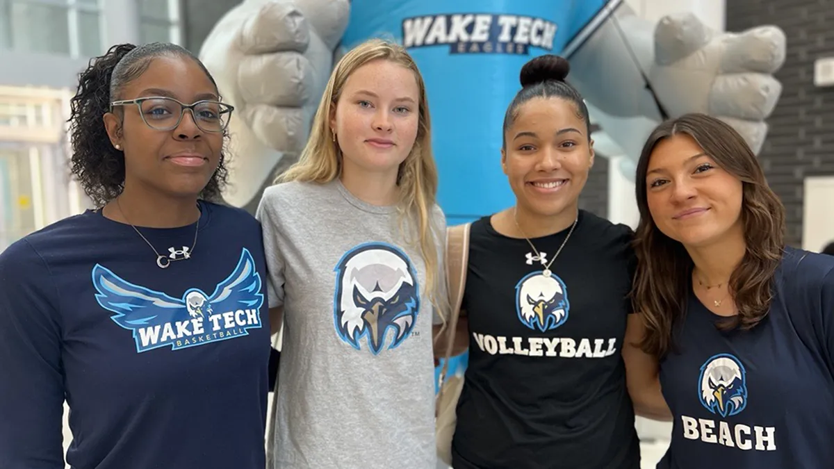Wake Tech students pose for a photo during a 2024 Open House.