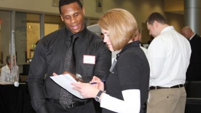 Biotech Students Network with Potential Employers