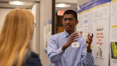 Mentor Melida Gibbs with intern Emma Allred, research: "Comparing Aquatic Biodiversity and Water Quality in Urban Retention Ponds and Natural Creeks"