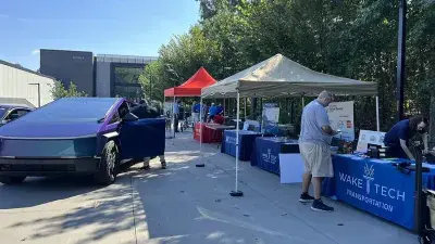 Electric vehicles are celebrated during a car show at the Hendrick Center for Automotive Excellence on Scott Northern Wake Campus.