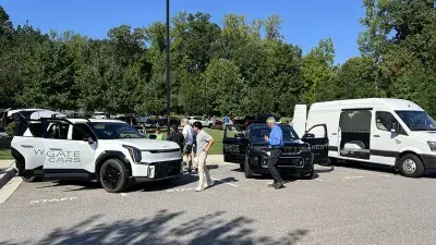 Electric vehicles are celebrated during a car show at the Hendrick Center for Automotive Excellence on Scott Northern Wake Campus.