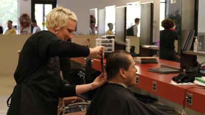 President Dr. Stephen Scott joined members of the Student Government Association getting haircuts in the college Cosmetology Salon.