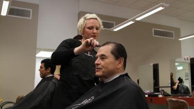 President Dr. Stephen Scott joined members of the Student Government Association getting haircuts in the college Cosmetology Salon.