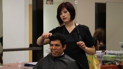 President Dr. Stephen Scott joined members of the Student Government Association getting haircuts in the college Cosmetology Salon.