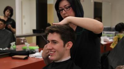 President Dr. Stephen Scott joined members of the Student Government Association getting haircuts in the college Cosmetology Salon.