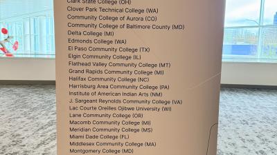 Wake Tech officials pose with the college's Leader College plaque.