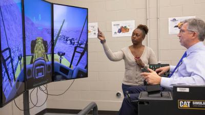 Dr. Ralls also observed the Heavy Equipment Operator simulation lab.