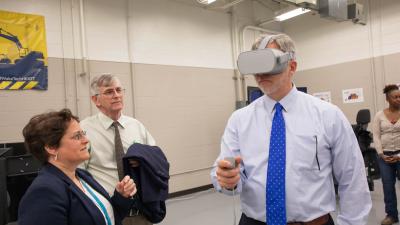 Dr. Ralls also observed the Heavy Equipment Operator simulation lab.