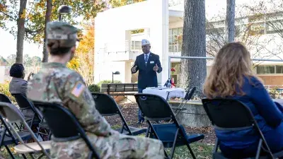 The Wake Tech Honor Guard presents the colors during a ceremony honoring military service members, veterans and their families.