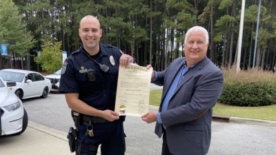 Officer Travis Smith, Chief Michael Penry 