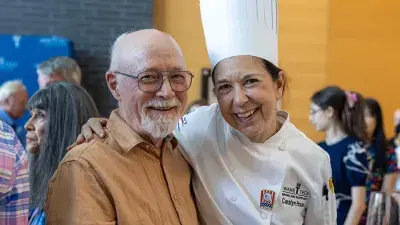 Members of Culinary Team USA prepare dishes for a fundraising dinner at Wake Tech that will help pay for expenses during the team's trip to Germany for the 2028 Culinary Olympics.