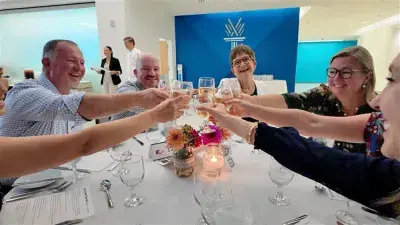 Members of Culinary Team USA prepare dishes for a fundraising dinner at Wake Tech that will help pay for expenses during the team's trip to Germany for the 2028 Culinary Olympics.