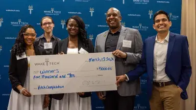 Judges listen to entrepreneurs pitch business ideas