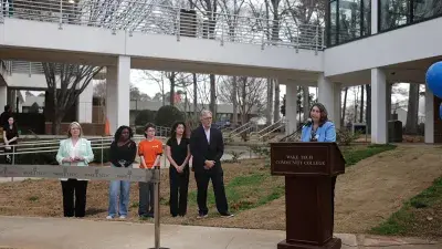 Image of students celebrating the reopening of Building C on the Southern Wake Campus, marking a major milestone in expanding innovative, STEM focused learning spaces for students.