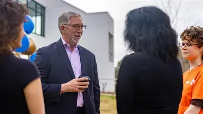 Image of students celebrating the reopening of Building C on the Southern Wake Campus, marking a major milestone in expanding innovative, STEM focused learning spaces for students.