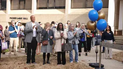 Image of students celebrating the reopening of Building C on the Southern Wake Campus, marking a major milestone in expanding innovative, STEM focused learning spaces for students.