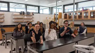 Image of students celebrating the reopening of Building C on the Southern Wake Campus, marking a major milestone in expanding innovative, STEM focused learning spaces for students.