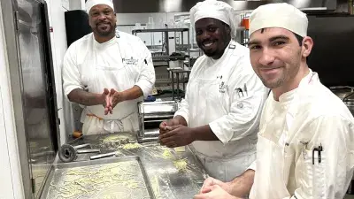 Chef Filippo Marini, right, created the menu for the "Ciao Down" fundraiser.