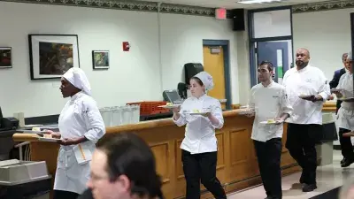Chef Filippo Marini, right, created the menu for the "Ciao Down" fundraiser.