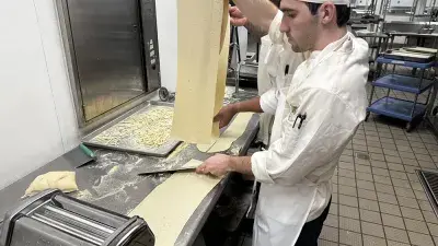 Chef Filippo Marini, right, created the menu for the "Ciao Down" fundraiser.