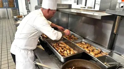 Chef Filippo Marini, right, created the menu for the "Ciao Down" fundraiser.
