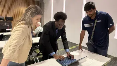 Wake Tech students and local business owners listen to a presentation during a cybersecurity workshop.