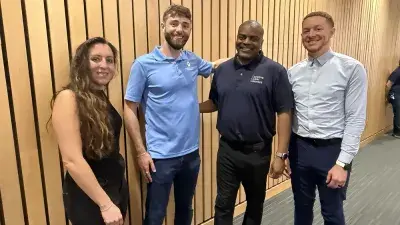 Wake Tech students and local business owners listen to a presentation during a cybersecurity workshop.