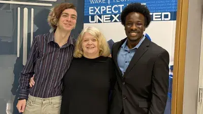 Wake Tech students and local business owners listen to a presentation during a cybersecurity workshop.