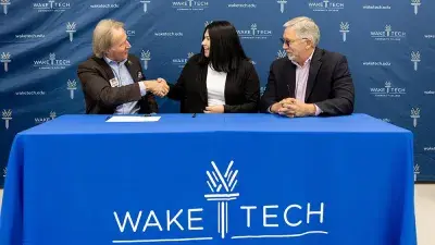 IT graduate Jennifer Medina & Wake Tech President Dr. Scott Ralls