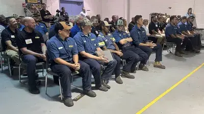 Gregory Poole apprentices gather with family and friends for a graduation ceremony.