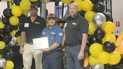 Gregory Poole apprentices gather with family and friends for a graduation ceremony.