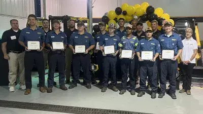 Gregory Poole apprentices gather with family and friends for a graduation ceremony.
