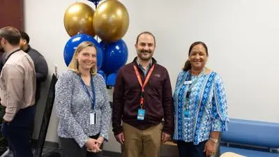 Wake Tech administrators and staff celebrate the opening of a library and tutoring space at the Beltline Education Center.