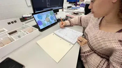 Interior Design students work on plans for a Wake County nonprofit.