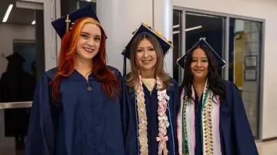 Wake Tech student process into the auditorium for the Fall 2025 commencement ceremony.